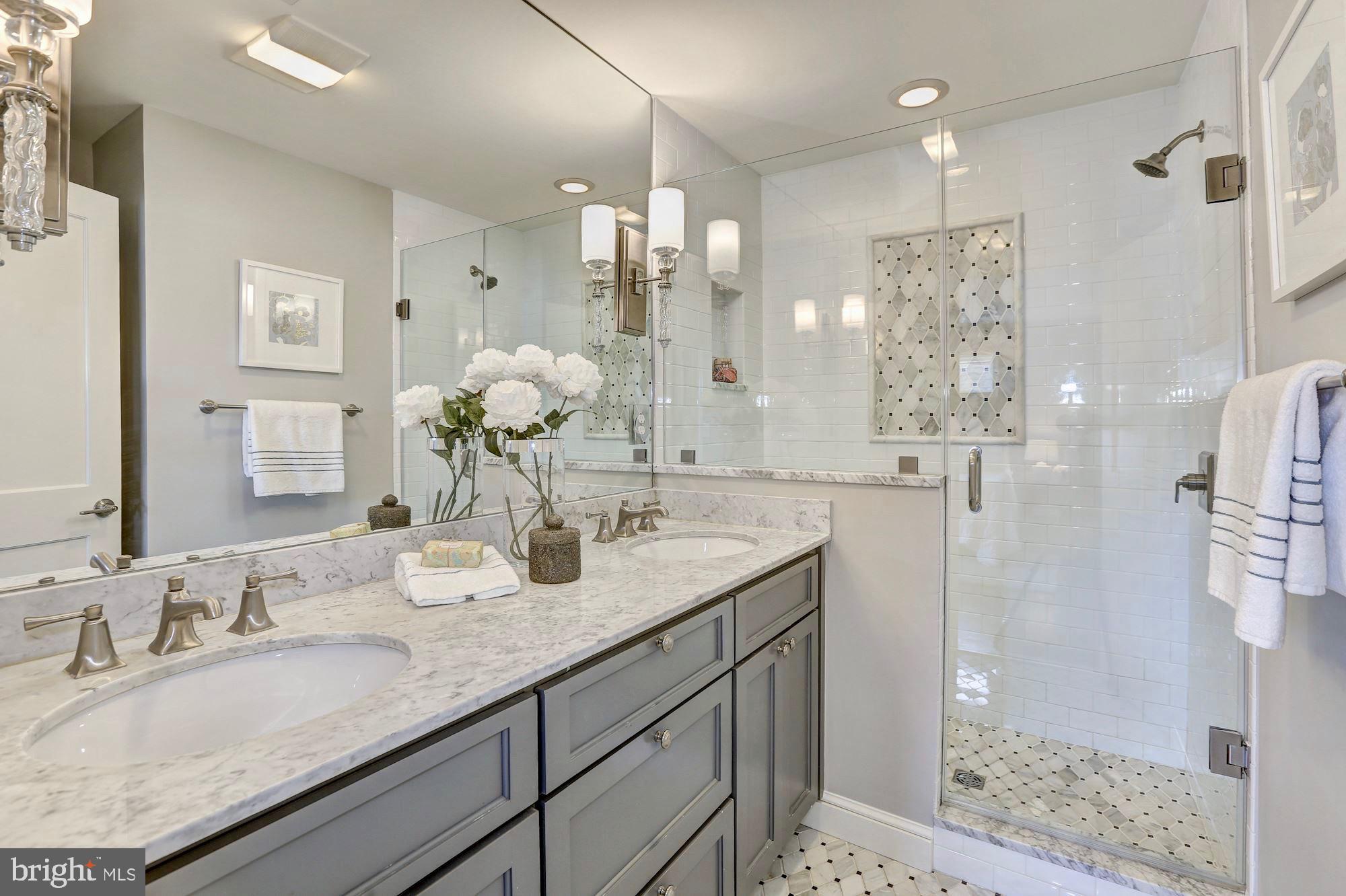 5324 Wakefield Road Bethesda, MD 20816 - Photo 22 of 40 Dual vanity, marble features, designer lighting.