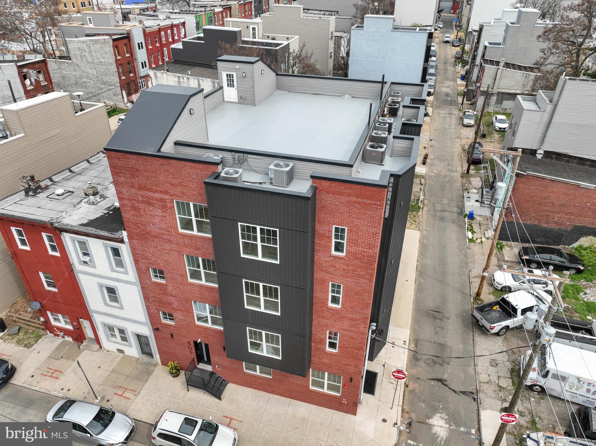 809 Diamond Street, Unit A101 Philadelphia, PA 19122 - Photo 15 of 17 an aerial view of a building with outdoor space