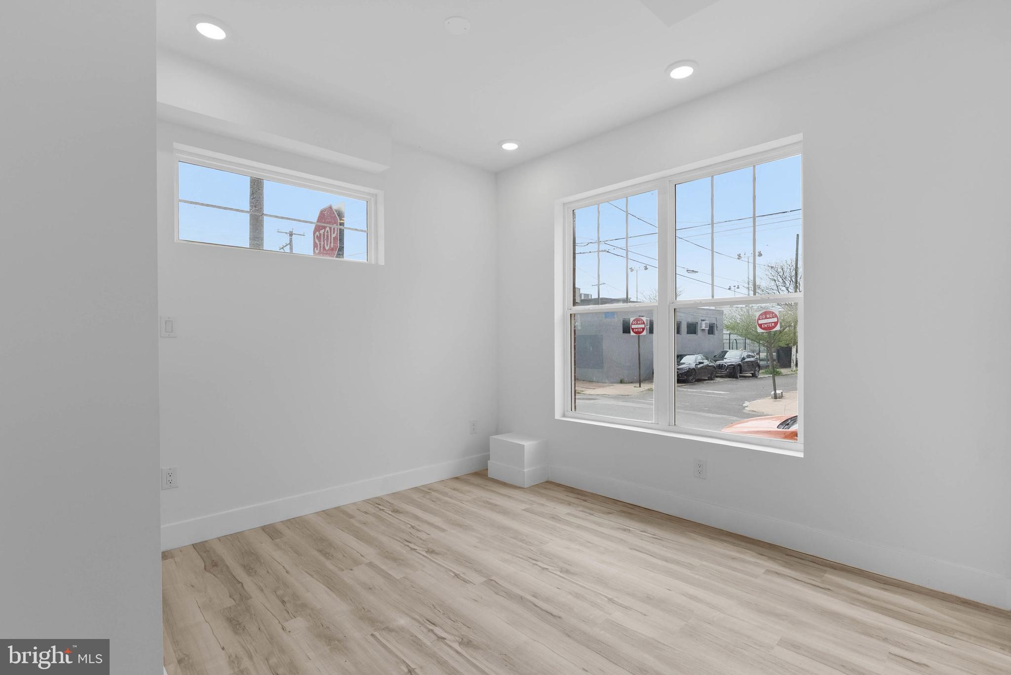 809 Diamond Street, Unit A101 Philadelphia, PA 19122 - Photo 8 of 17 a view of wooden floor in a room