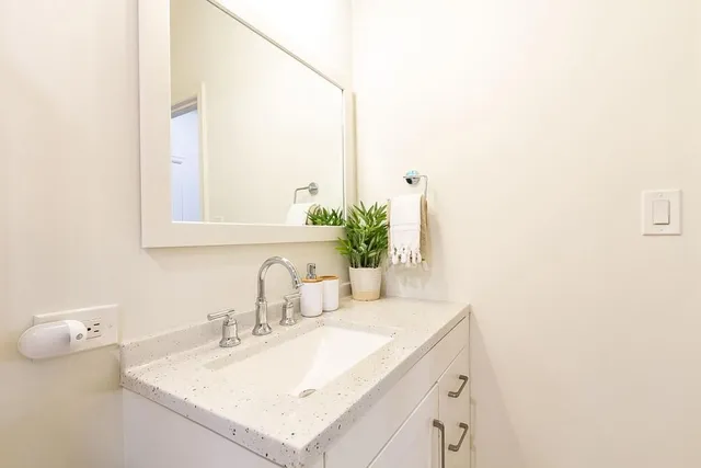 a view of swimming pool with furniture