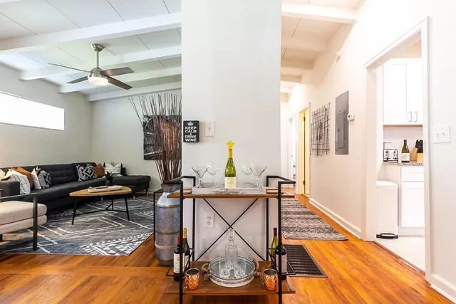 a balcony with furniture and a fireplace