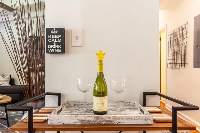 a view of a wooden chairs on the deck