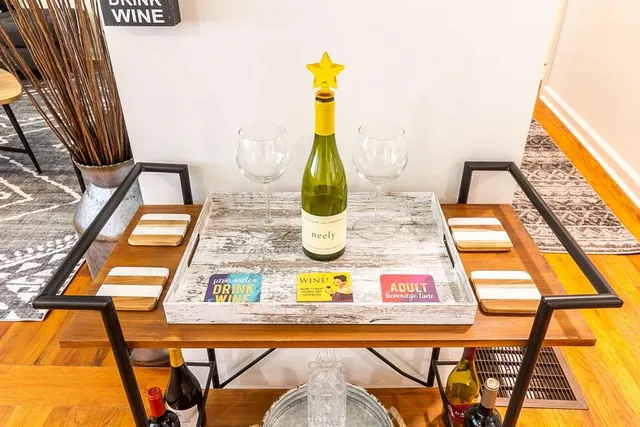 a table and chairs in front of a house
