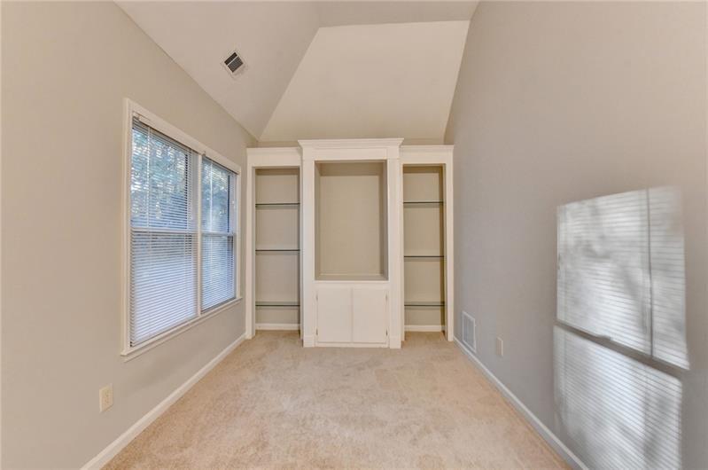 655 Golden Meadows Lane Suwanee, GA 30024 - Photo 32 of 73 an empty room with windows