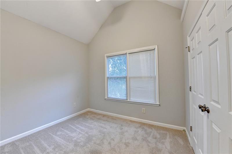 655 Golden Meadows Lane Suwanee, GA 30024 - Photo 39 of 73 a view of an empty room with a window