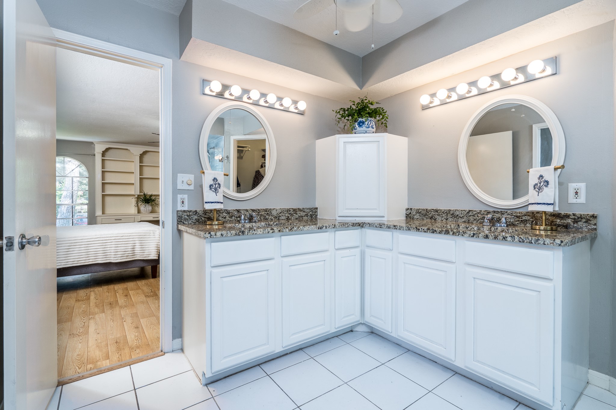 6527 Castle Pine Lane Spring, TX 77379 - Photo 30 of 47 The beautiful primary bath offers a spa-like retreat with double sinks, his-and-her closets, and elegant granite countertops.