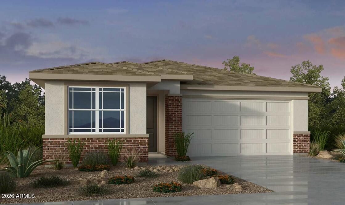 17132 West Briles Road Surprise, AZ 85387 - Photo 1 of 31 a front view of a house with a yard