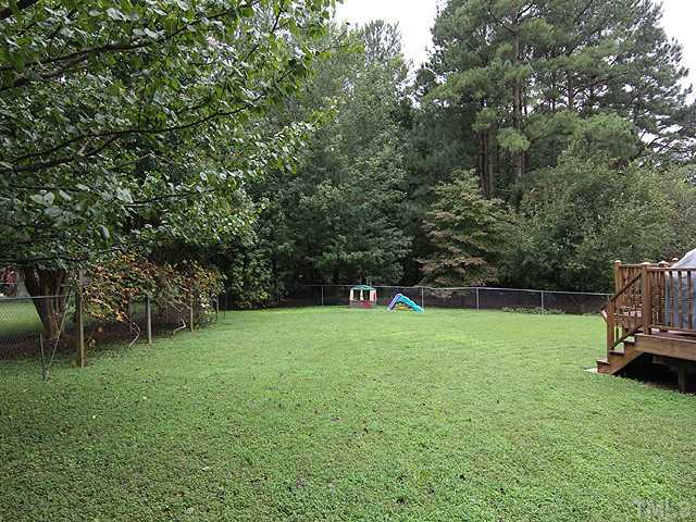 8312 Kestrel Drive Raleigh, NC 27615 - Photo 23 of 24 WORKSHOP WITH ELECTRICITY AND OUTDOOR LIGHTING IS USED FOR PROJECTS OR STORAGE
