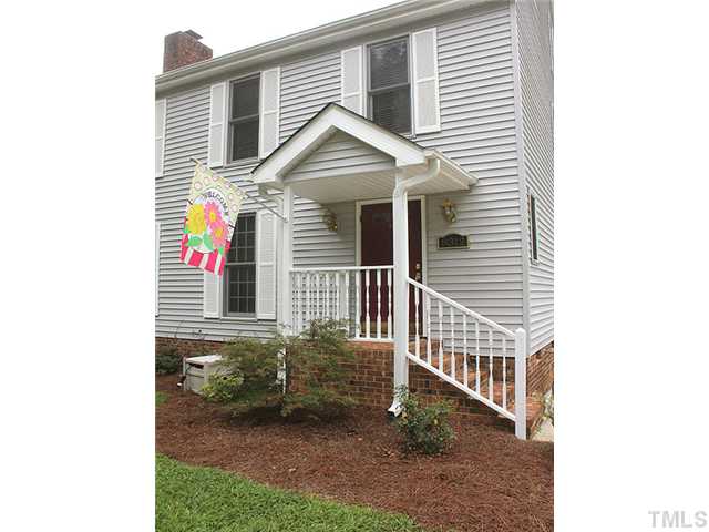 FRONT PORCH WELCOMES YOU INTO A LOVELY FOYER
