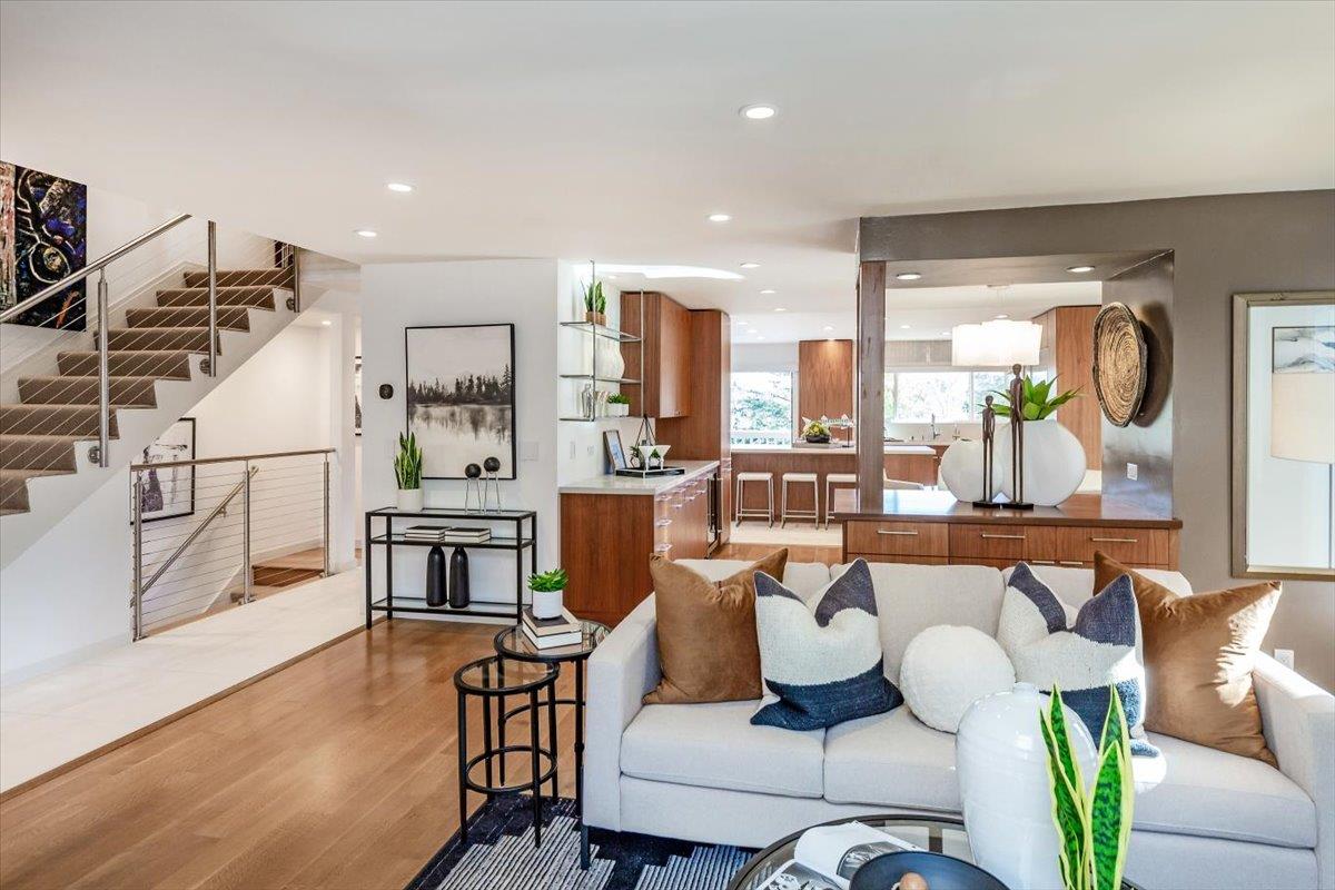 a living room with furniture and a table