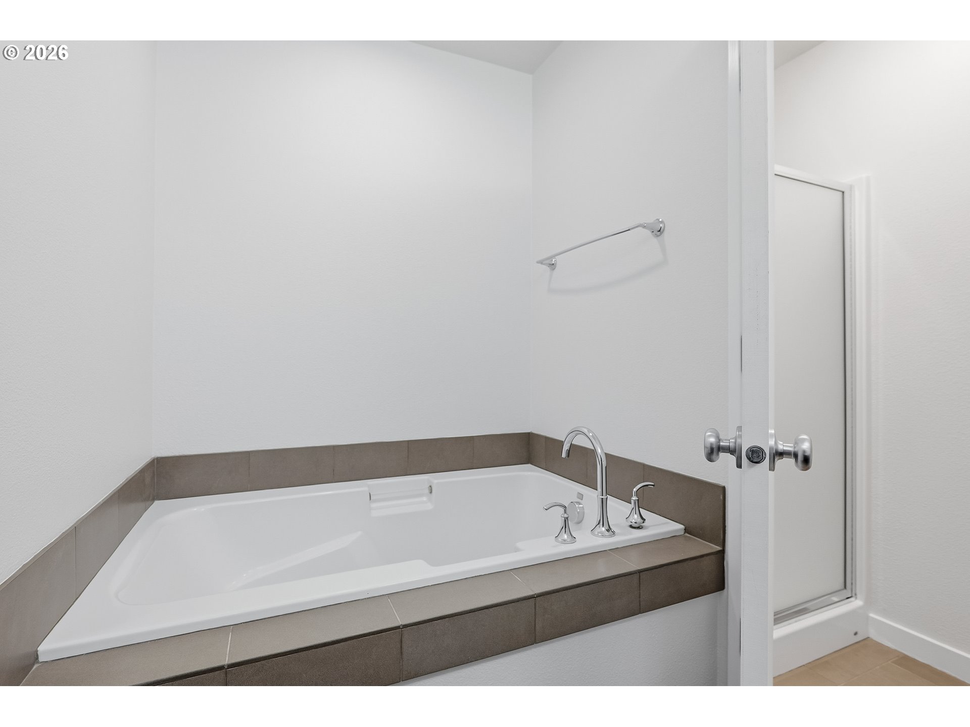 16012 Northwest Centine Lane Portland, OR 97229 - Photo 18 of 24 a bathroom with a sink and a bathtub