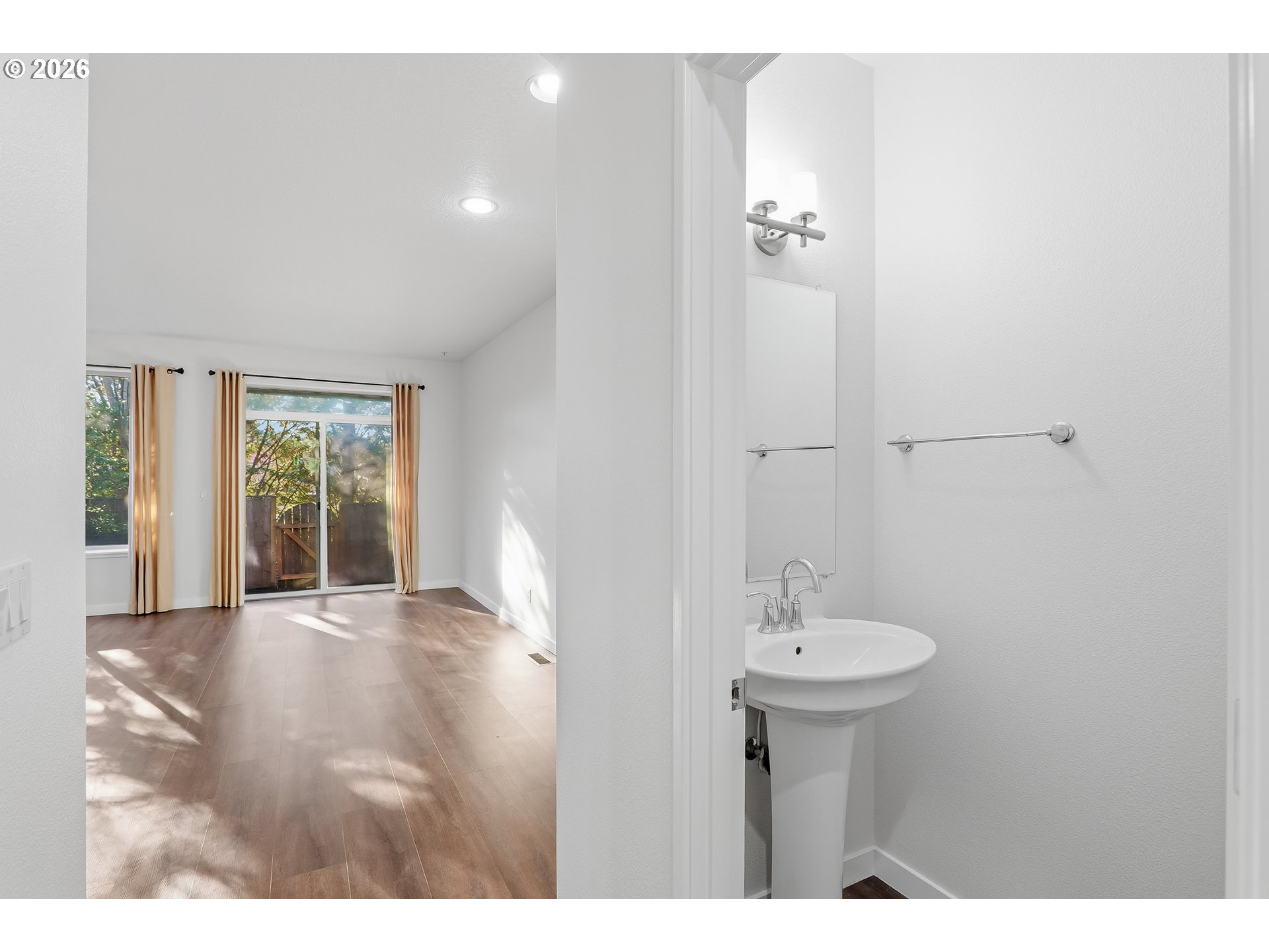 16012 Northwest Centine Lane Portland, OR 97229 - Photo 3 of 24 a bathroom with a sink and a mirror