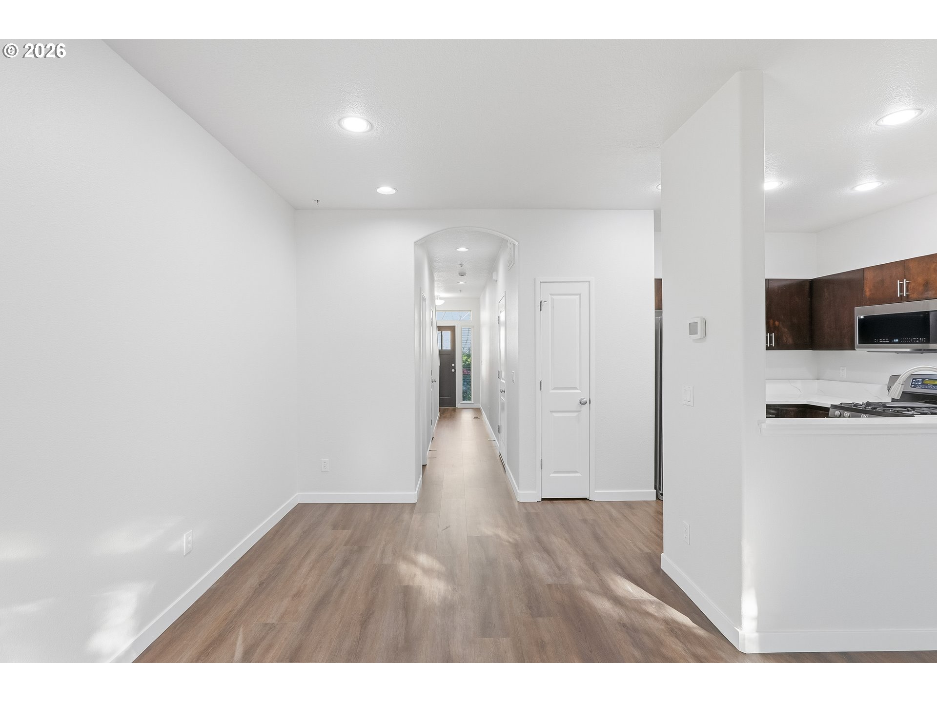 16012 Northwest Centine Lane Portland, OR 97229 - Photo 4 of 24 a view of a kitchen with wooden floor