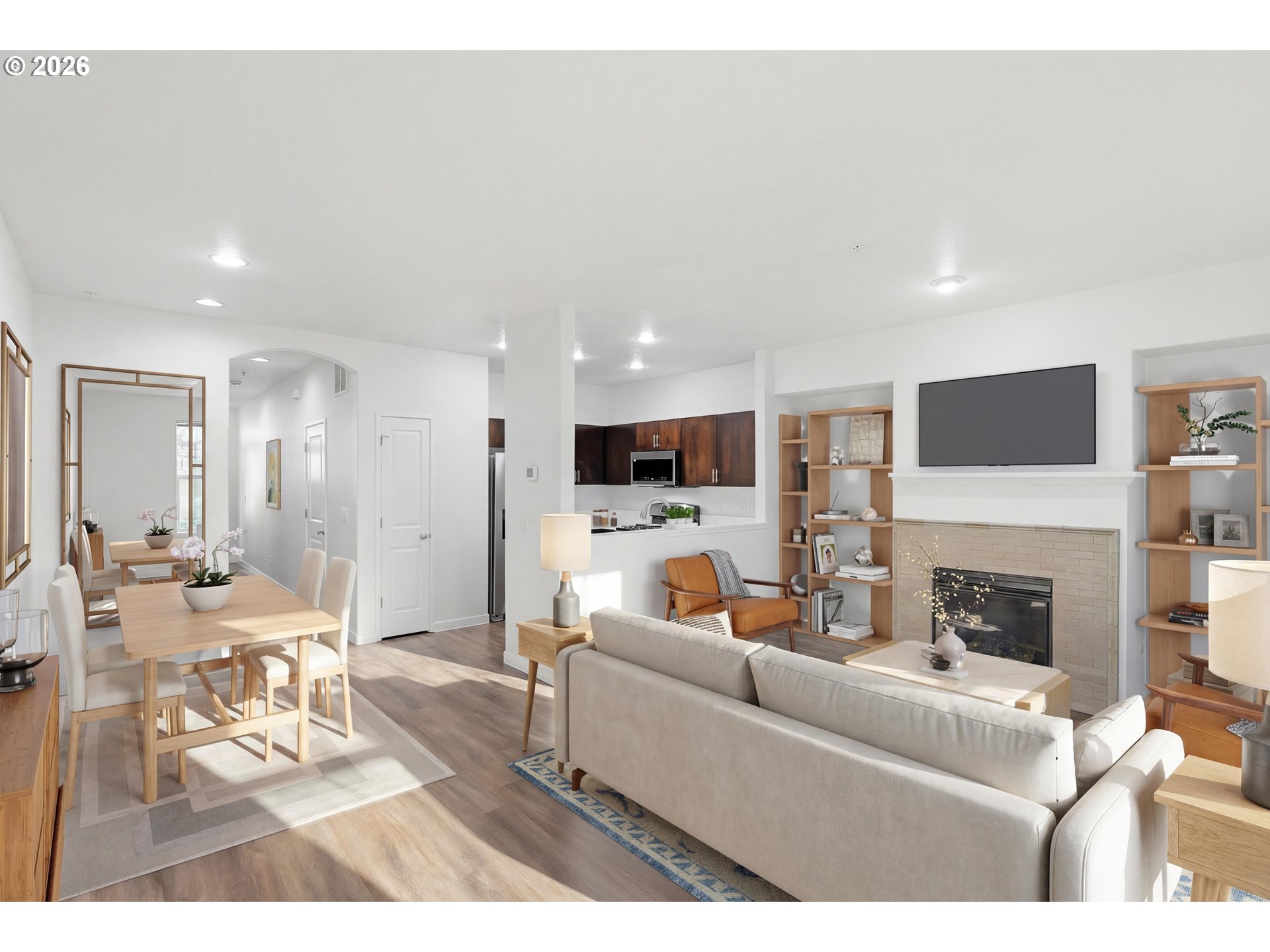 16012 Northwest Centine Lane Portland, OR 97229 - Photo 5 of 24 a living room with furniture a fireplace and a flat screen tv