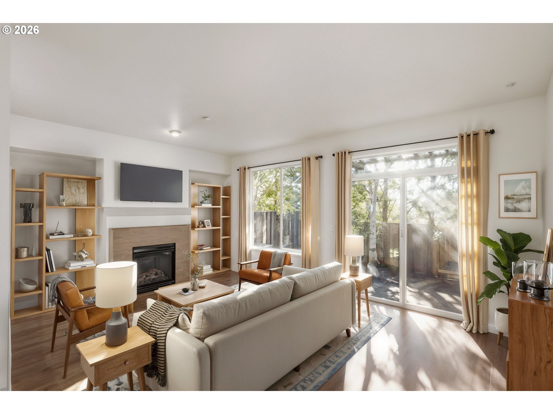16012 Northwest Centine Lane Portland, OR 97229 - Photo 7 of 24 a living room with furniture large window and a fireplace