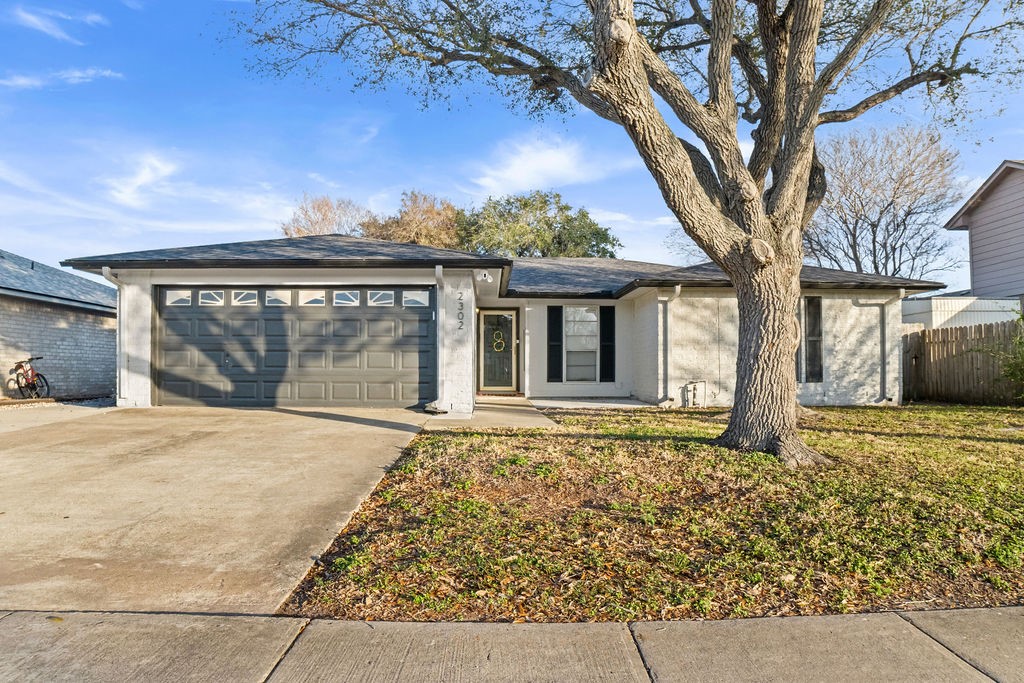 2302 Memorial Parkway Portland, TX 78374 - Photo 1 of 21 front view of a house with a large window