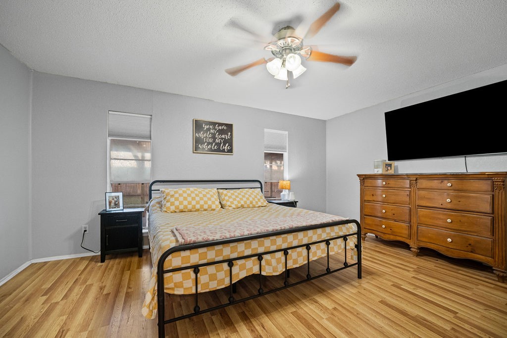 2302 Memorial Parkway Portland, TX 78374 - Photo 13 of 21 a bedroom with a bed and a flat screen tv