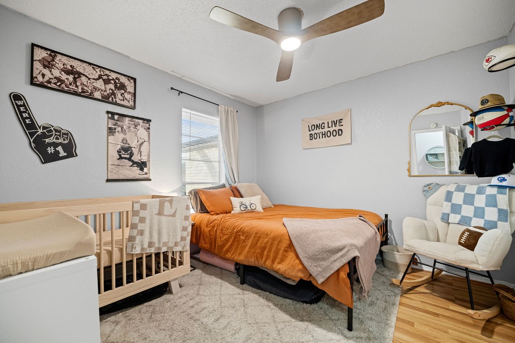 2302 Memorial Parkway Portland, TX 78374 - Photo 15 of 21 a bedroom with a bed and a table in it