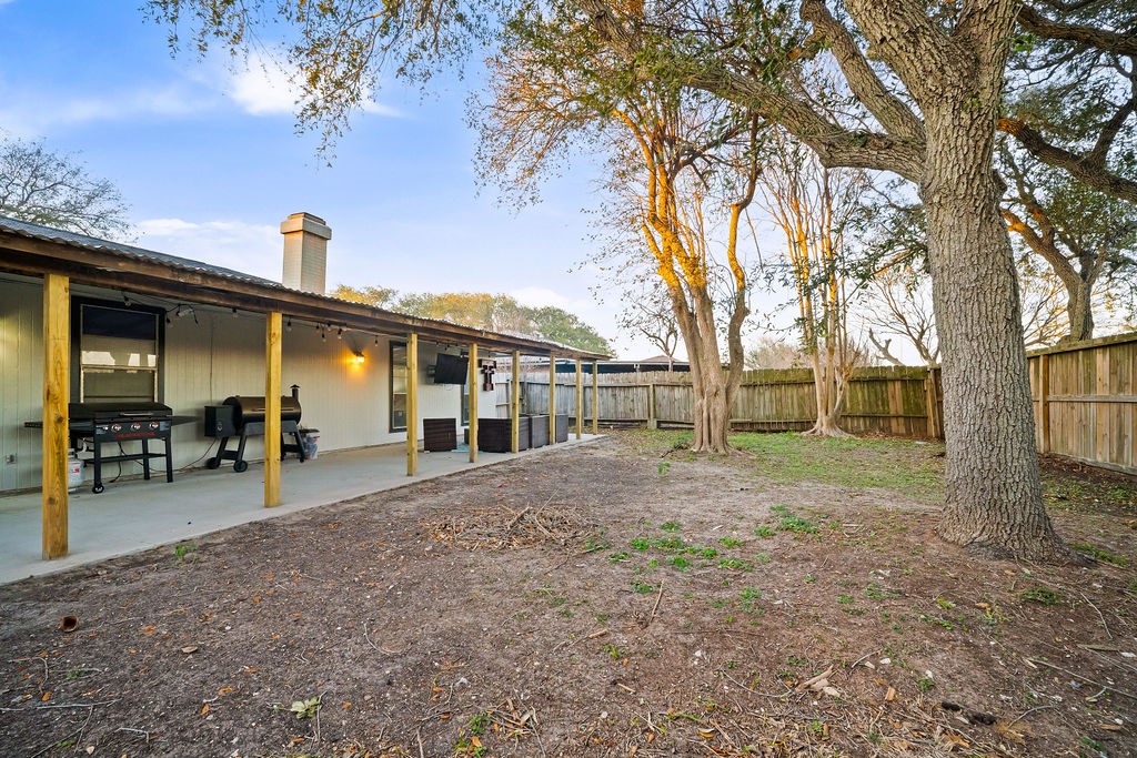2302 Memorial Parkway Portland, TX 78374 - Photo 20 of 21 a view of a house with a yard and seating space