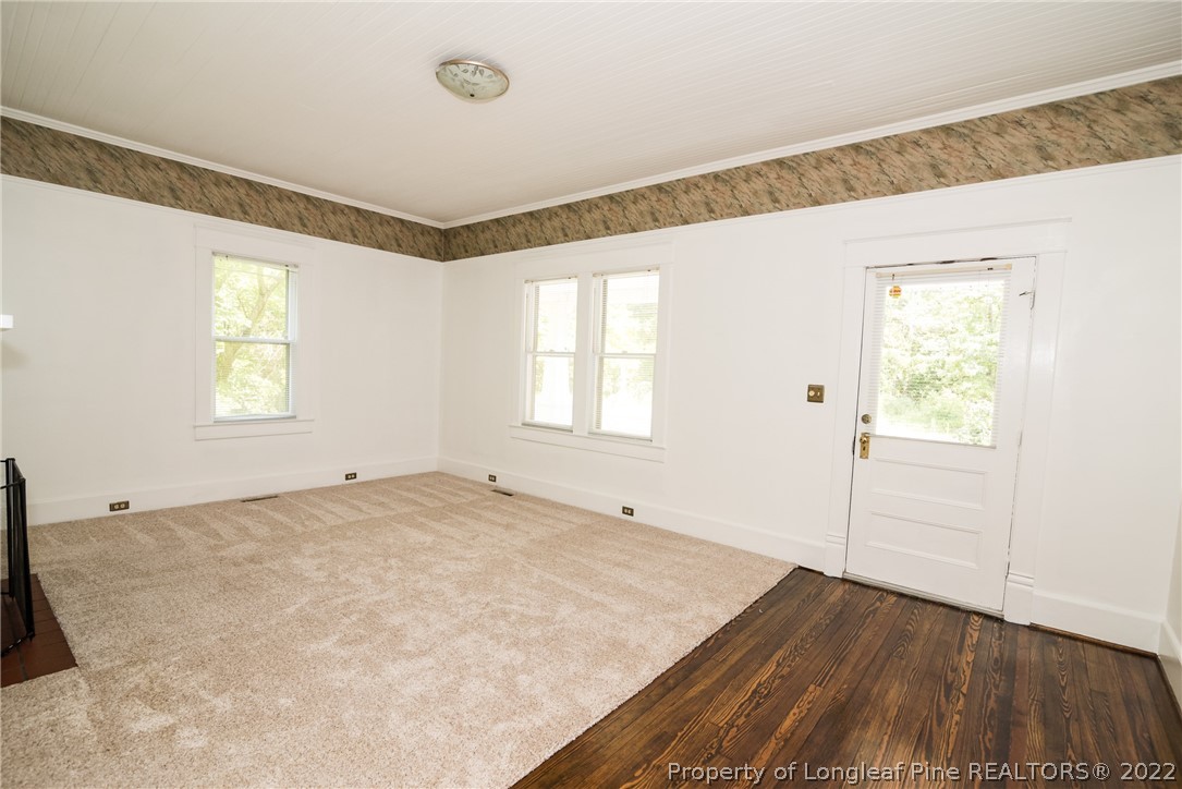 3316 Old River Road Carthage, NC 28327 - Photo 15 of 35 a view of a room with wooden floor and windows