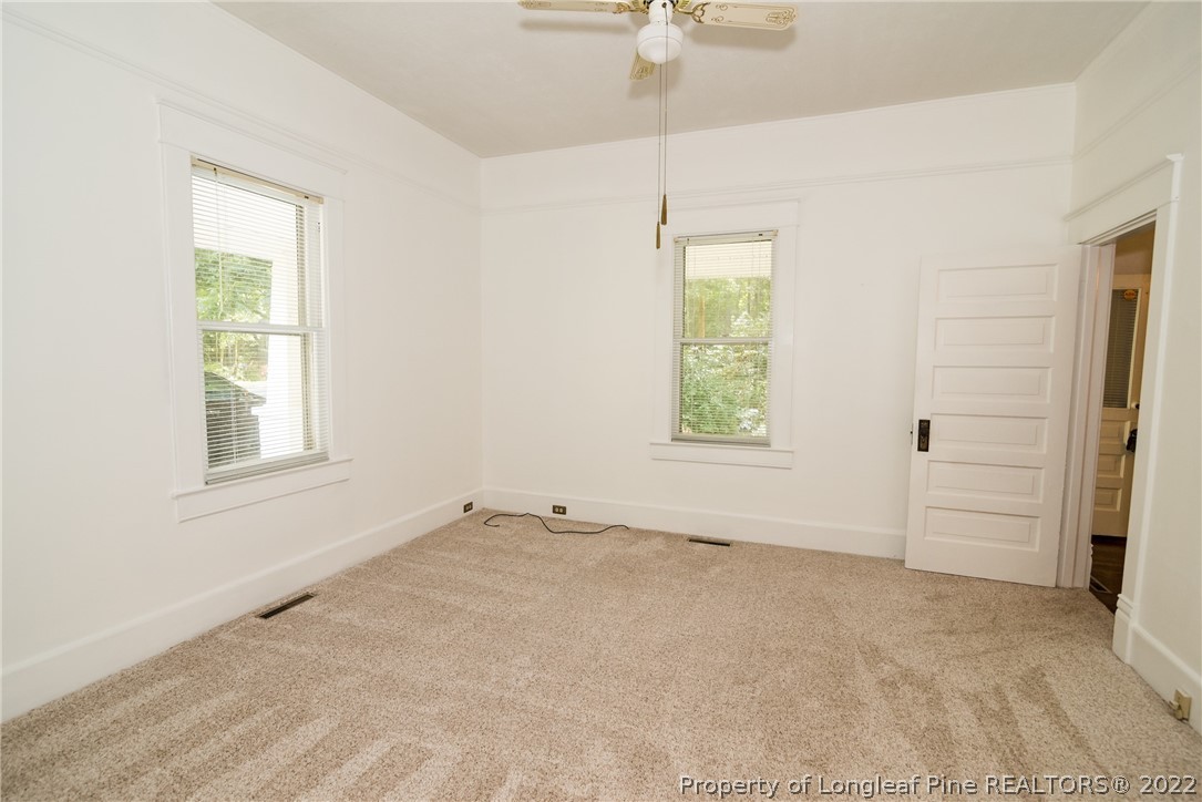 3316 Old River Road Carthage, NC 28327 - Photo 6 of 35 an empty room with windows and closet