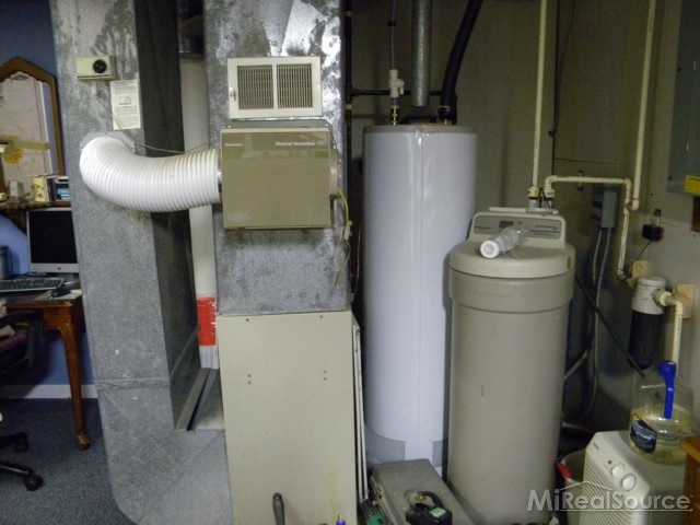 13219 Tibbets Road Memphis, MI 48041 - Photo 14 of 21 This is a view of the mechanicals in the basement.