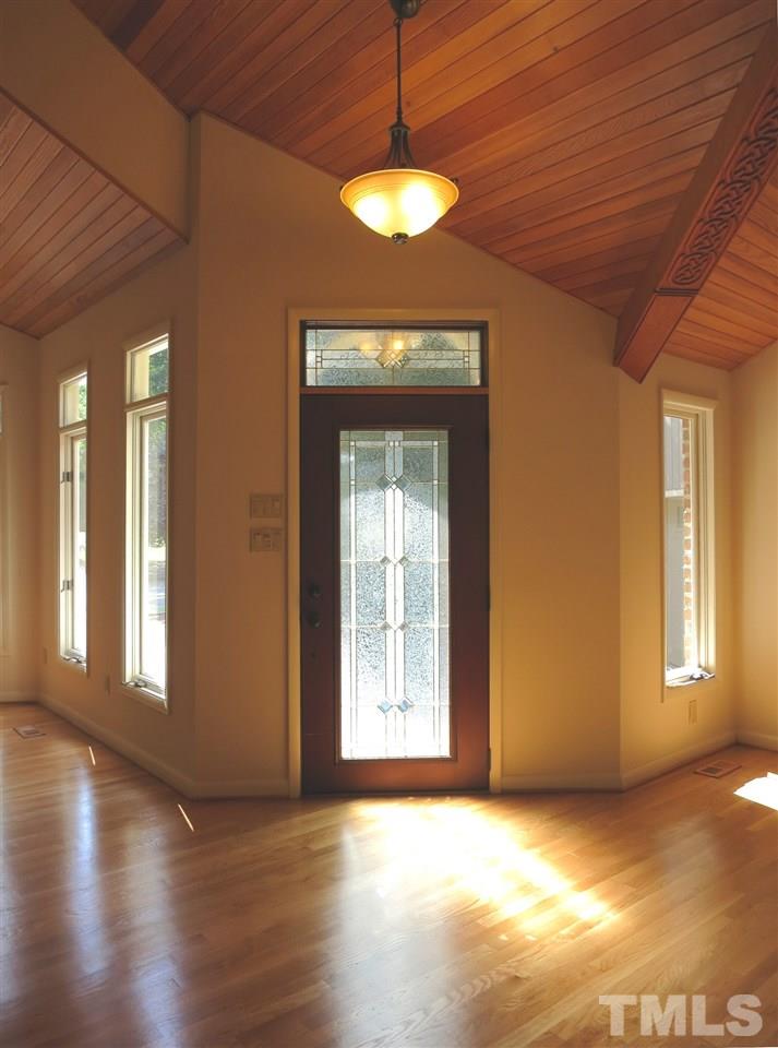 9209 Litchford Road Raleigh, NC 27615 - Photo 2 of 25 a view of a room with window and wooden floor
