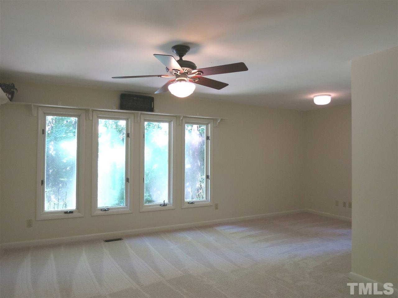 9209 Litchford Road Raleigh, NC 27615 - Photo 15 of 25 a view of an empty room with a window