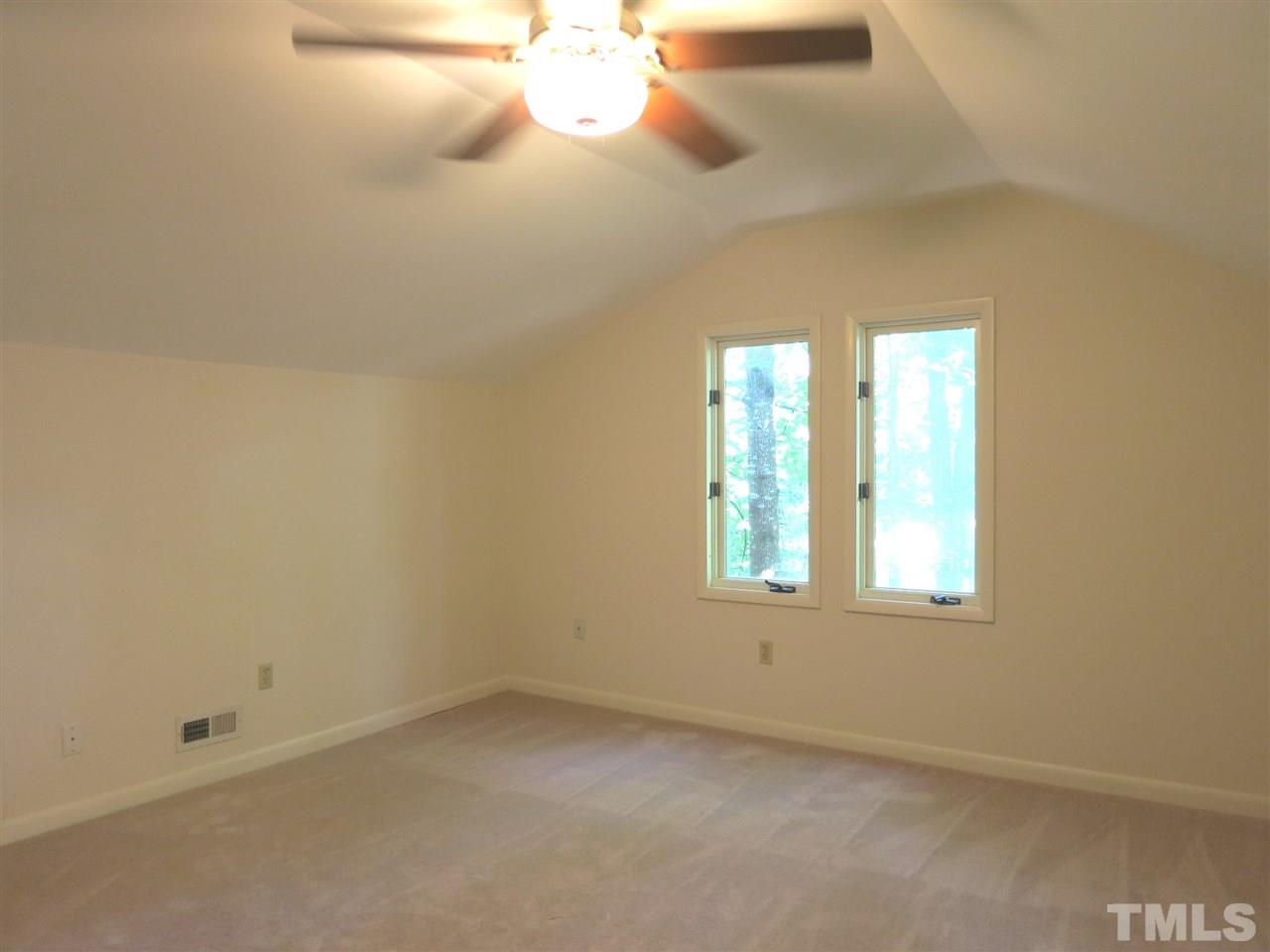 9209 Litchford Road Raleigh, NC 27615 - Photo 20 of 25 an empty room with a window