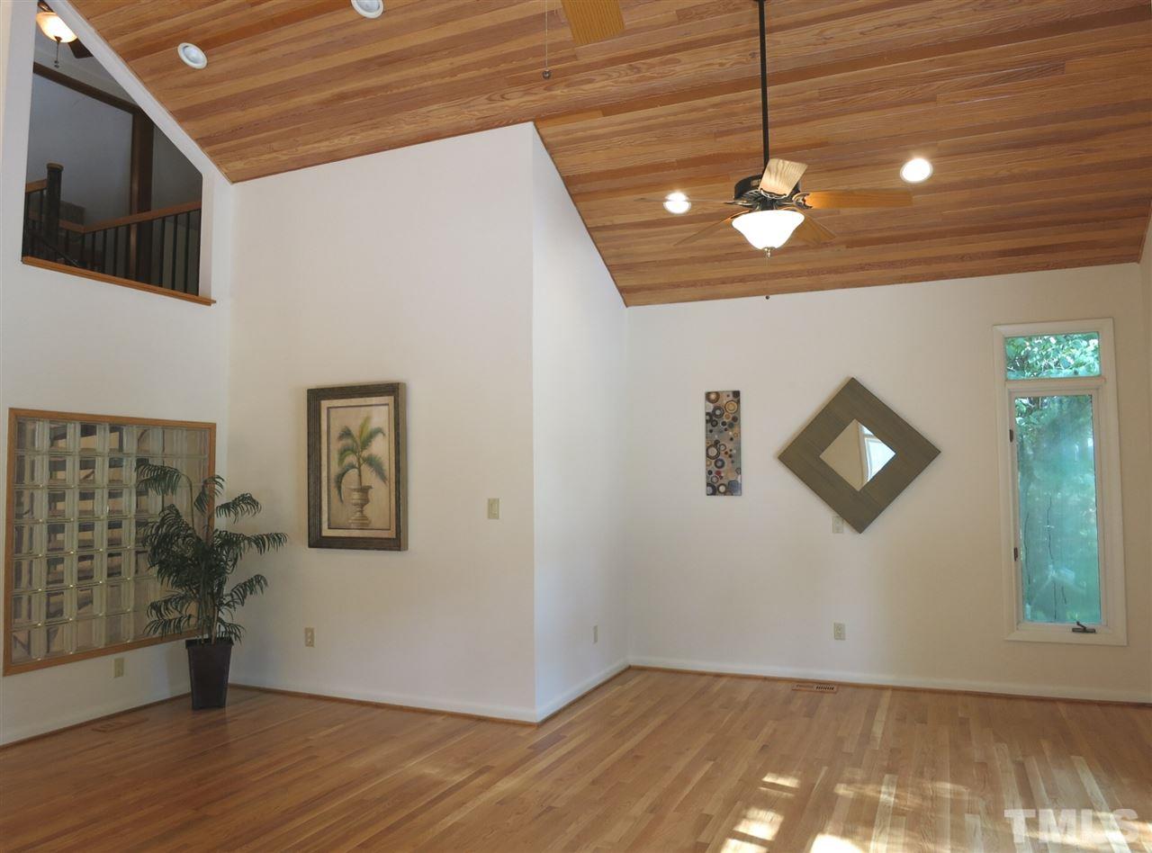 9209 Litchford Road Raleigh, NC 27615 - Photo 6 of 25 a view of a livingroom with wooden floor