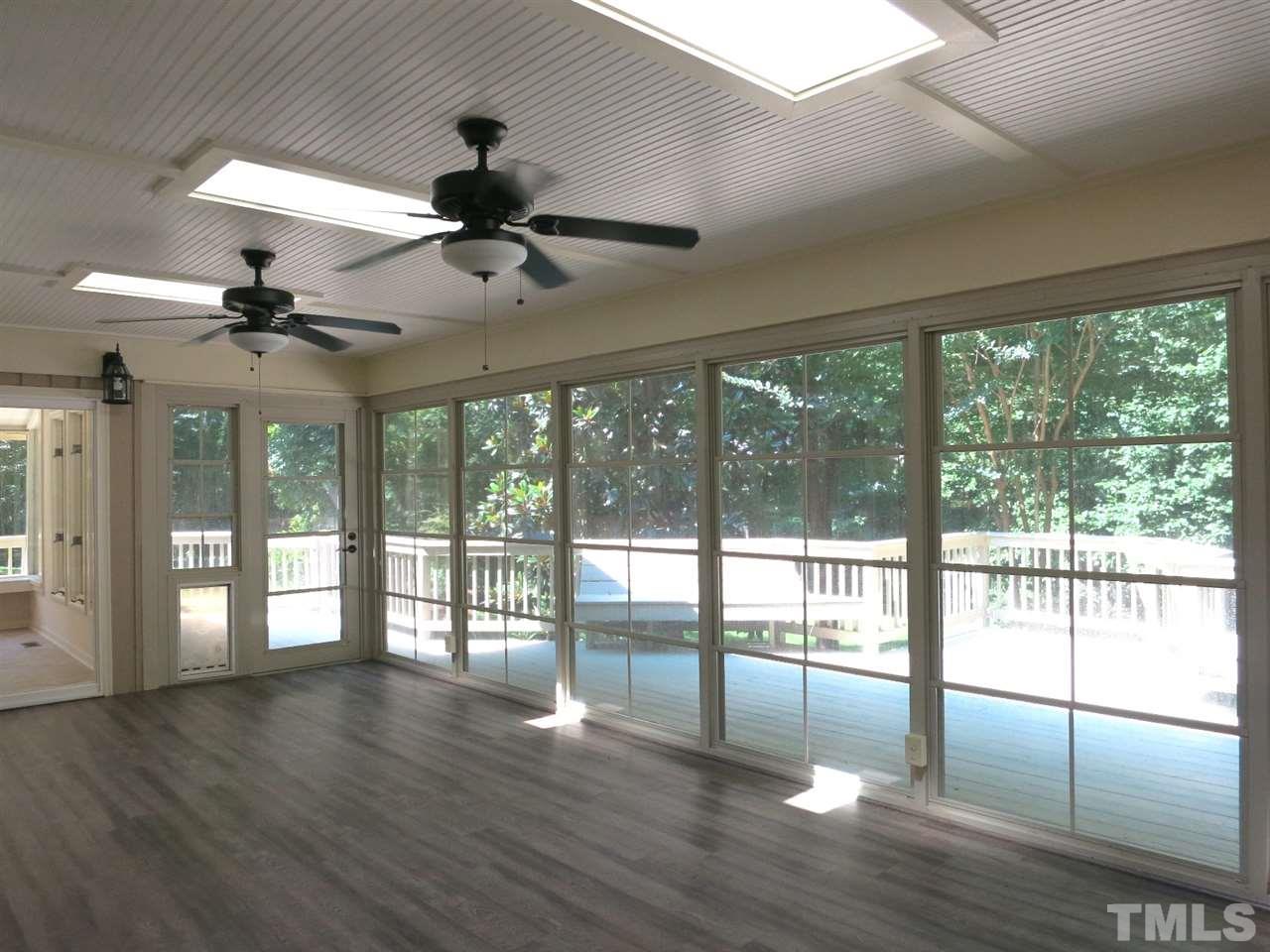 9209 Litchford Road Raleigh, NC 27615 - Photo 10 of 25 a view of an entryway with wooden floor