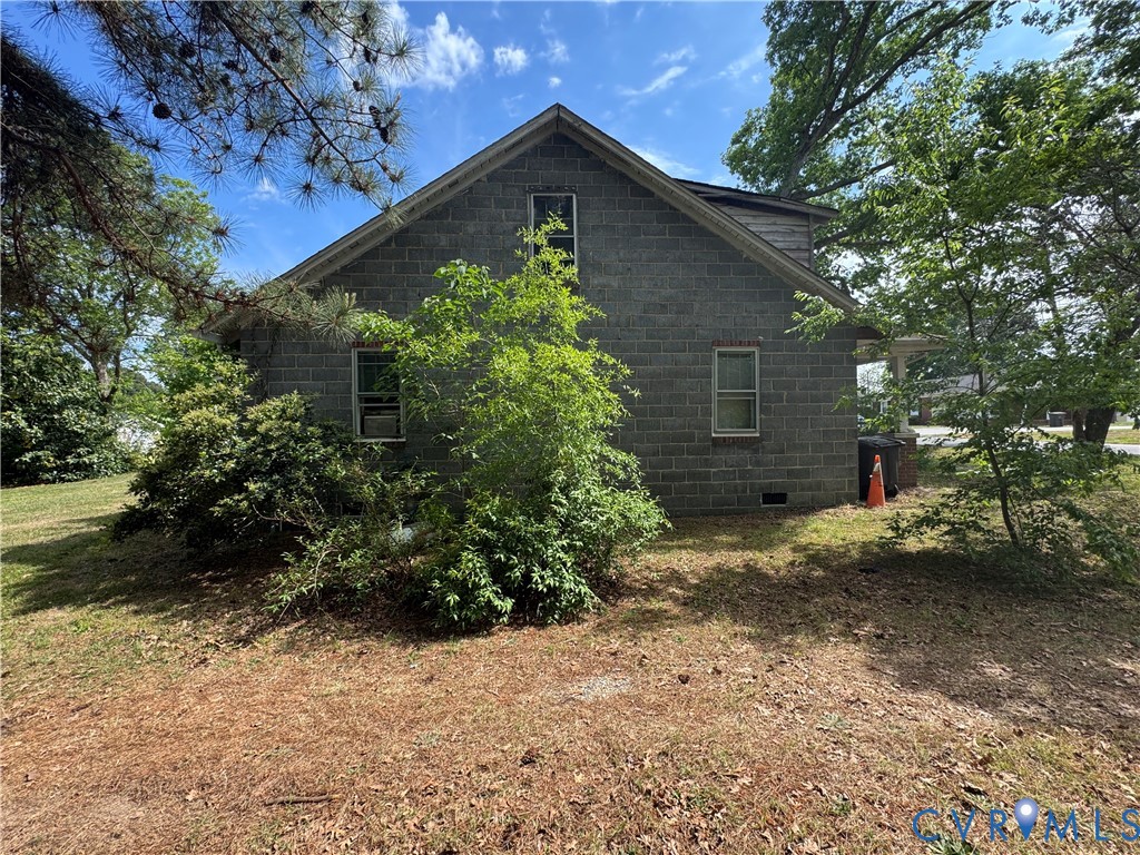 303 Purdy Road Emporia, VA 23847 - Photo 6 of 18 a view of a house with a yard