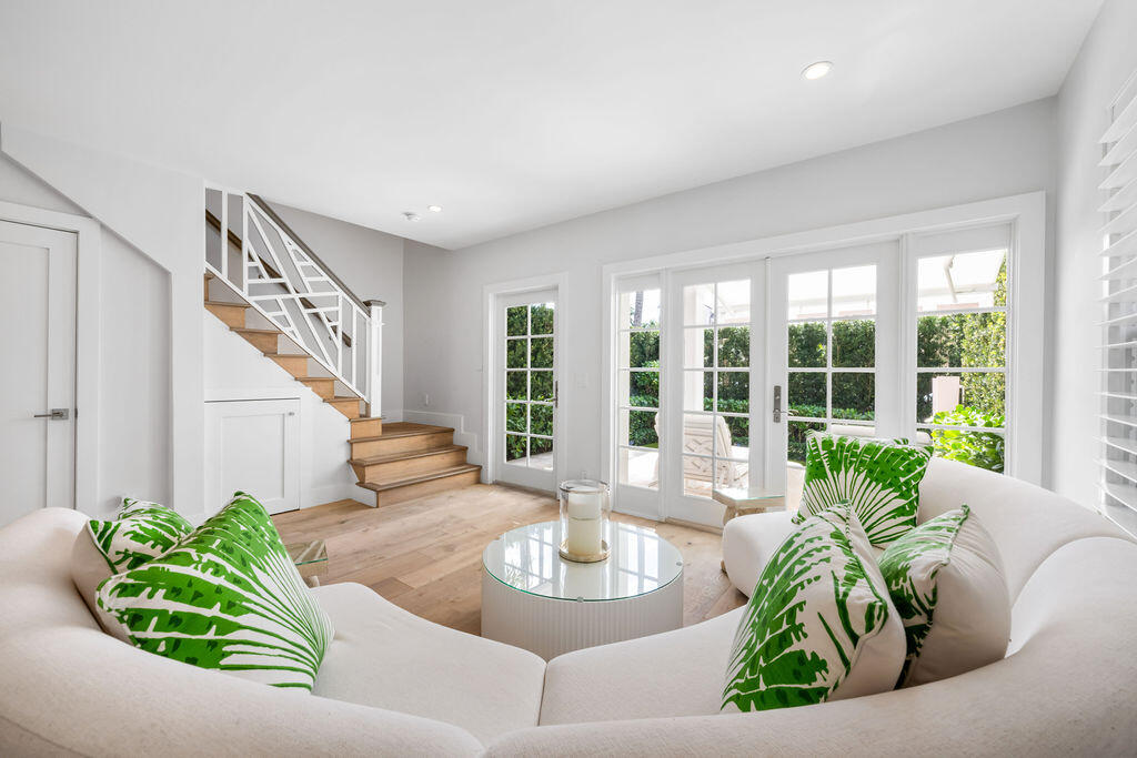 173 Peruvian Avenue, Unit 5 Palm Beach, FL 33480 - Photo 2 of 12 a living room with furniture and a large window