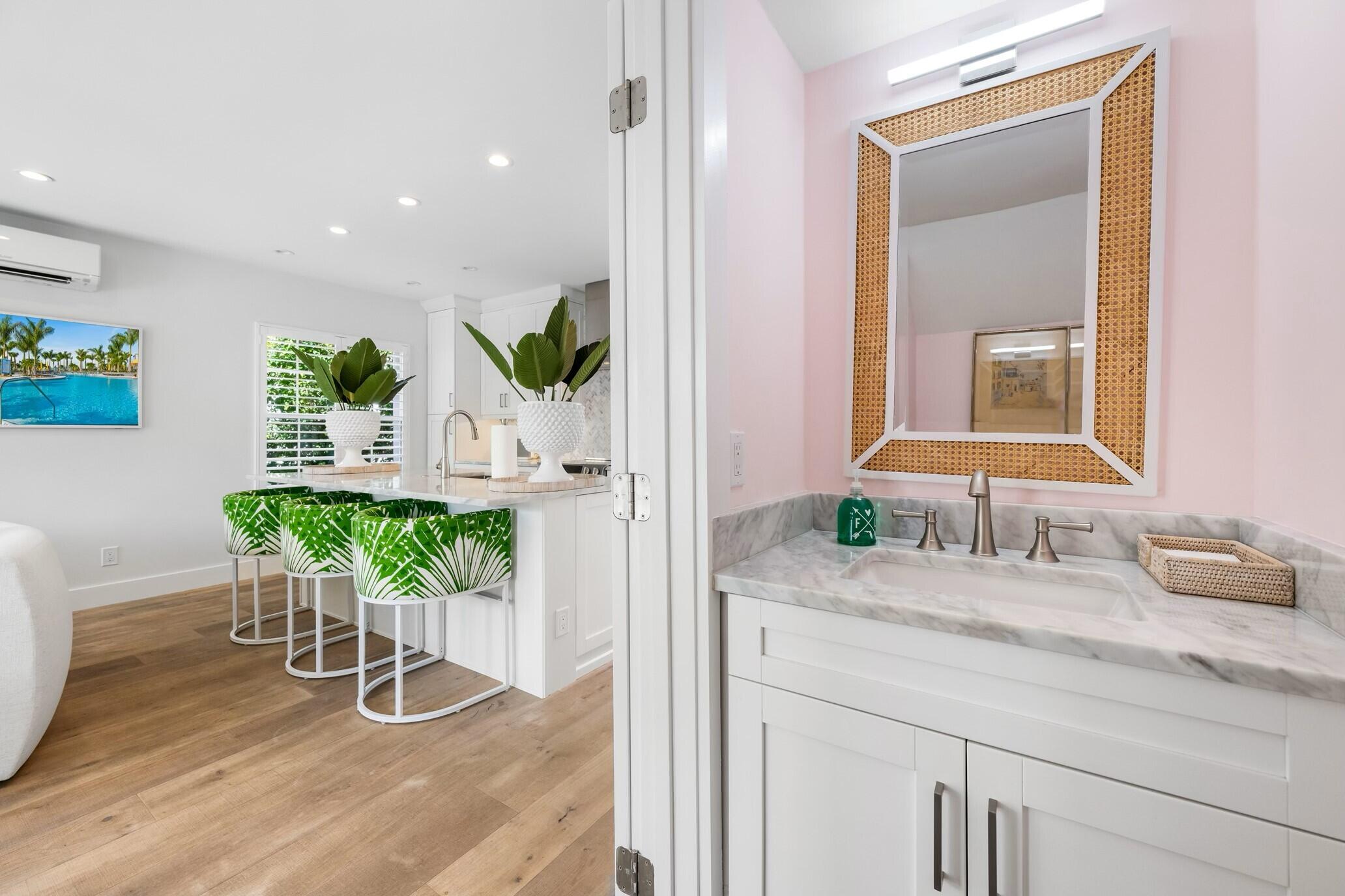 173 Peruvian Avenue, Unit 5 Palm Beach, FL 33480 - Photo 6 of 12 a bathroom with a sink and a mirror