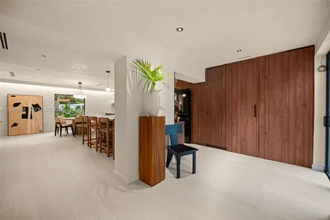 a view of a kitchen and dining room