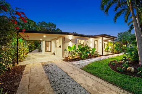 a house view with a garden space