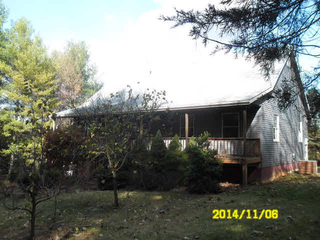 677 Curry Road Churchville, VA 24421 - Photo 1 of 20 a view of house with sign board and yard