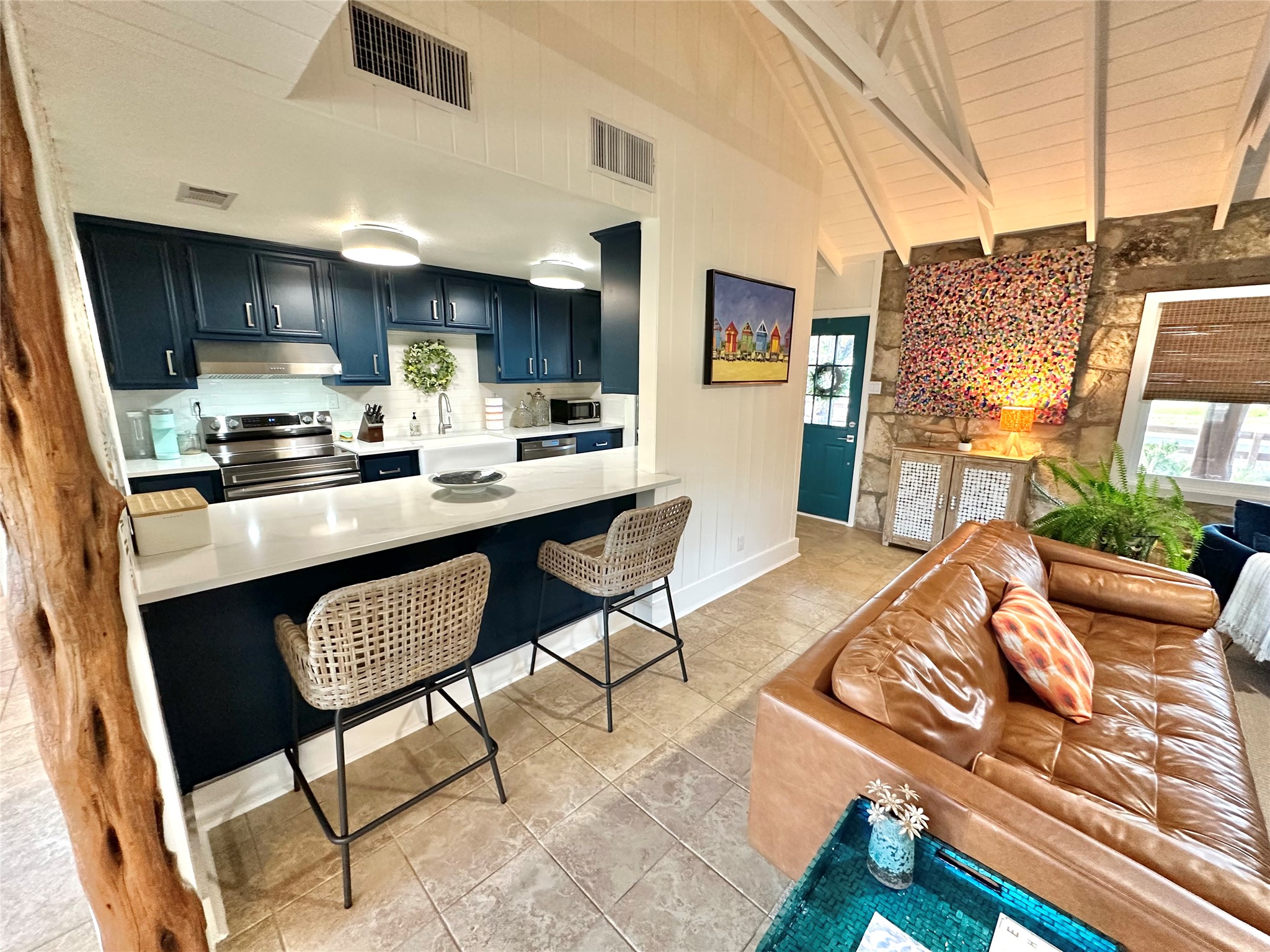 29 Presidio Road Wimberley, TX 78676 - Photo 11 of 36 a kitchen view of a dining table chairs and entryway