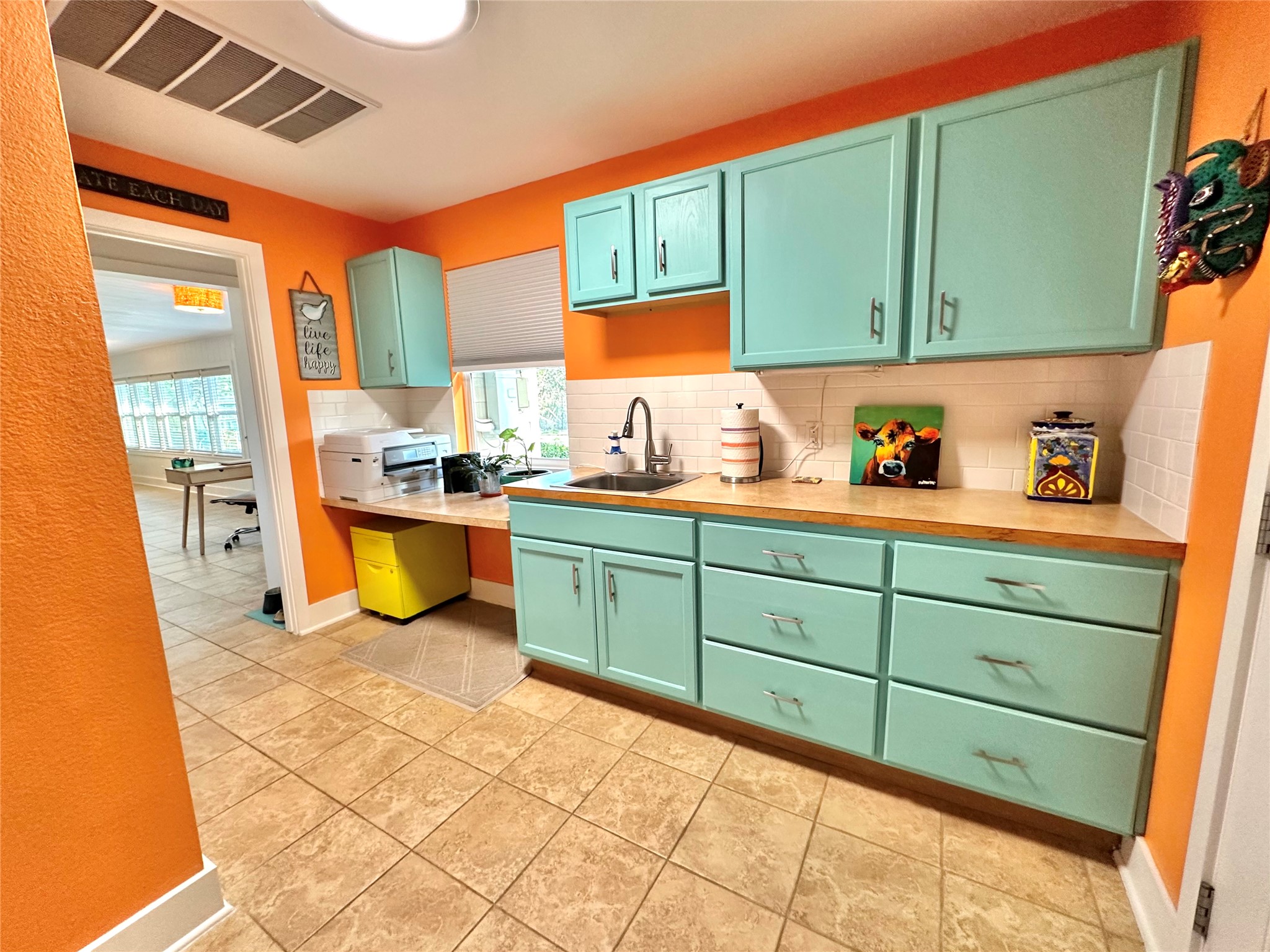 29 Presidio Road Wimberley, TX 78676 - Photo 21 of 36 a kitchen with sink and cabinets
