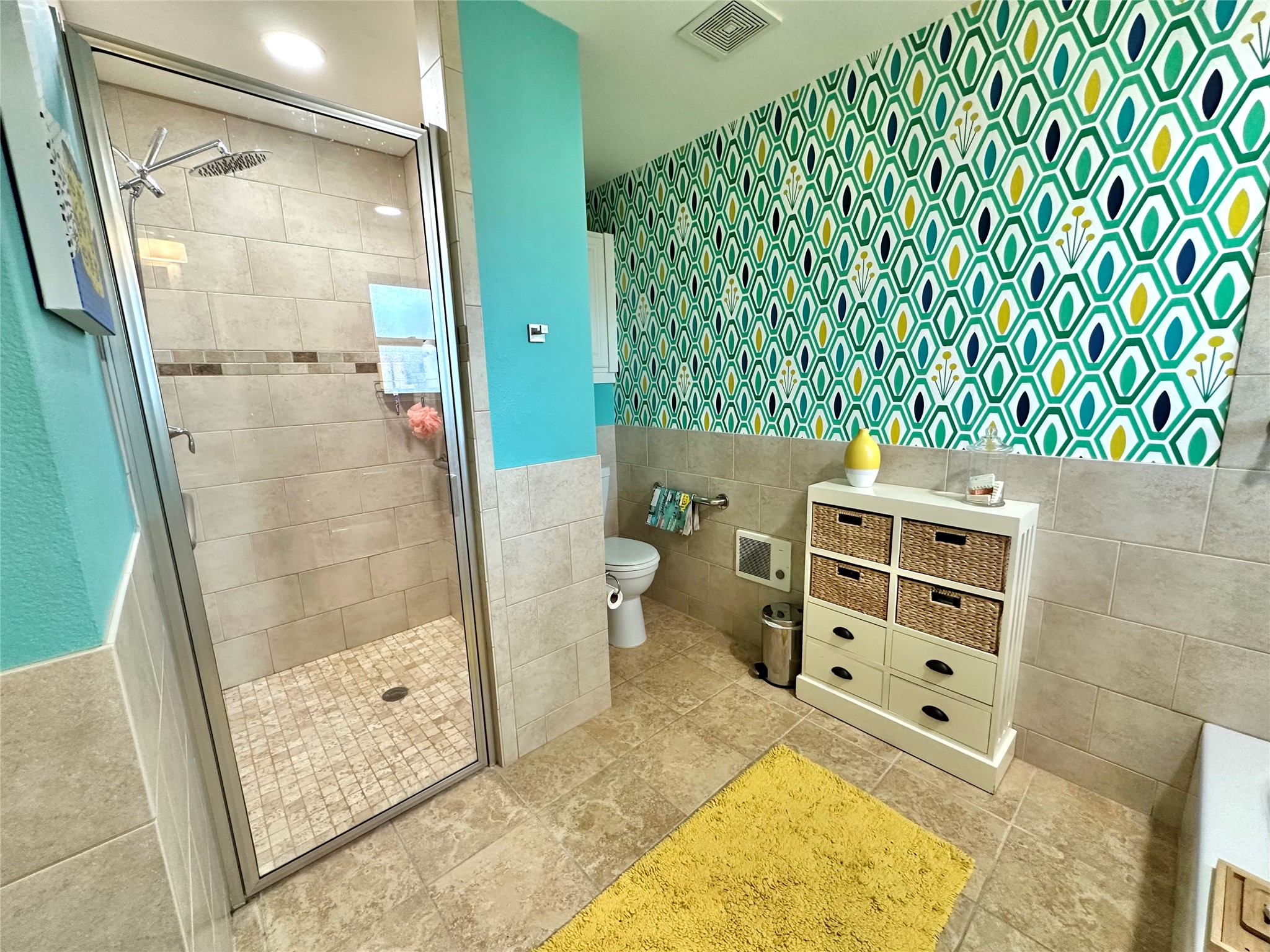 29 Presidio Road Wimberley, TX 78676 - Photo 24 of 36 a bathroom with a bathtub and shower