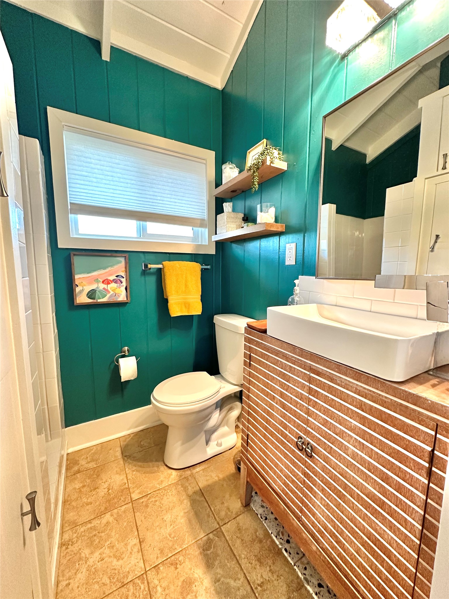 29 Presidio Road Wimberley, TX 78676 - Photo 28 of 36 a bathroom with a sink a toilet and mirror