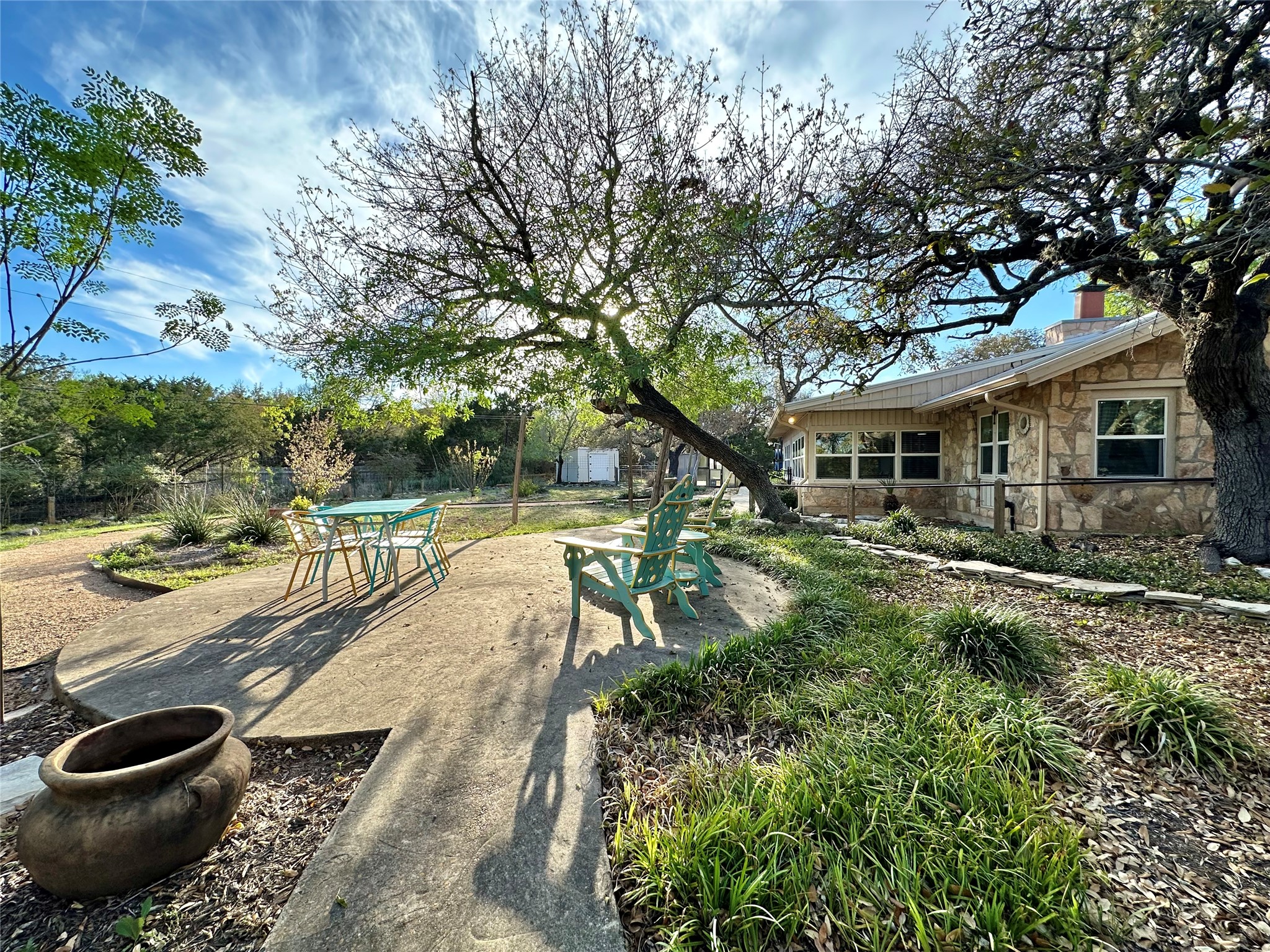 29 Presidio Road Wimberley, TX 78676 - Photo 34 of 36 a view of a backyard with sitting area