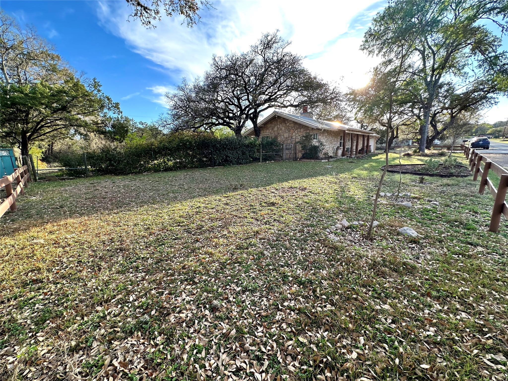 29 Presidio Road Wimberley, TX 78676 - Photo 4 of 36 a view of backyard of house with green space