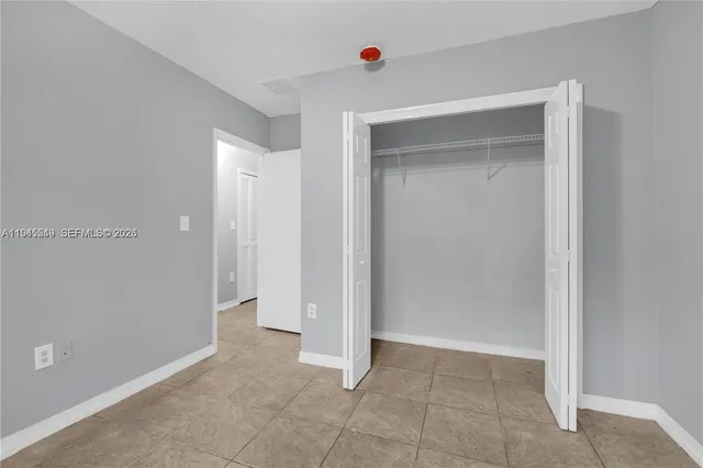 a bathroom with a sink a toilet and bathtub