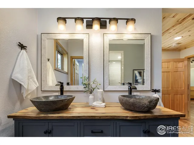 a picture of a bathroom with a shower