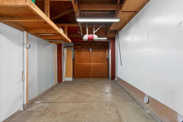 a view of a hallway with a room