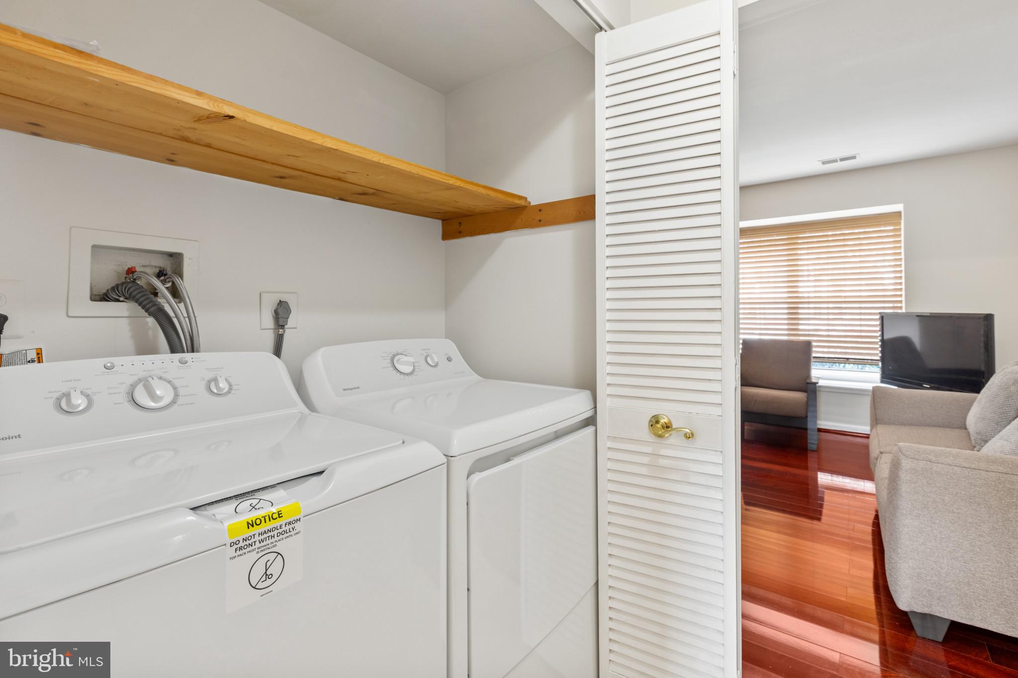 2 Dawn View Court Silver Spring, MD 20904 - Photo 12 of 25 Laundry area featuring wood-type flooring, hookup