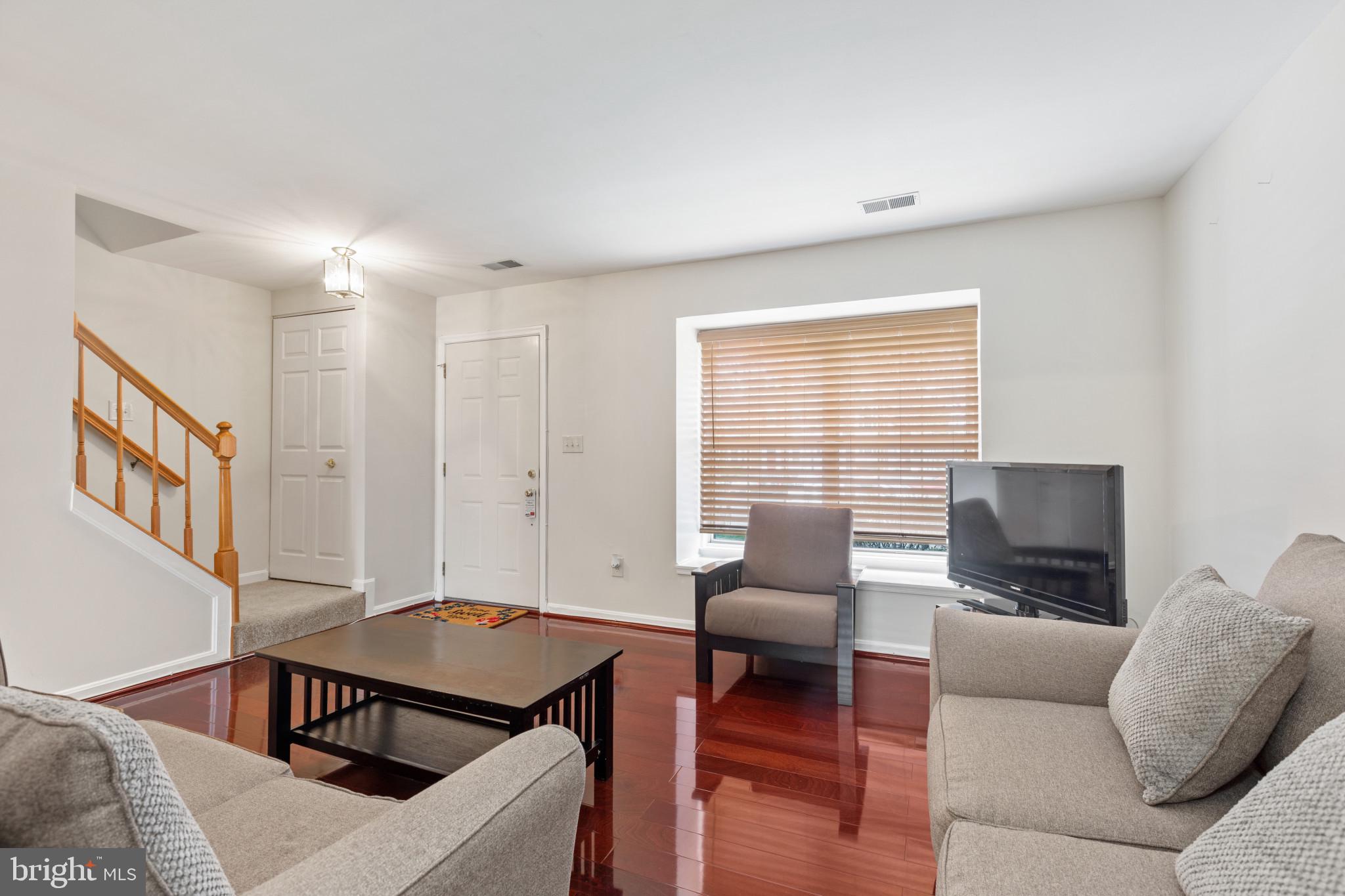 2 Dawn View Court Silver Spring, MD 20904 - Photo 6 of 25 Living room with dark wood-type flooring