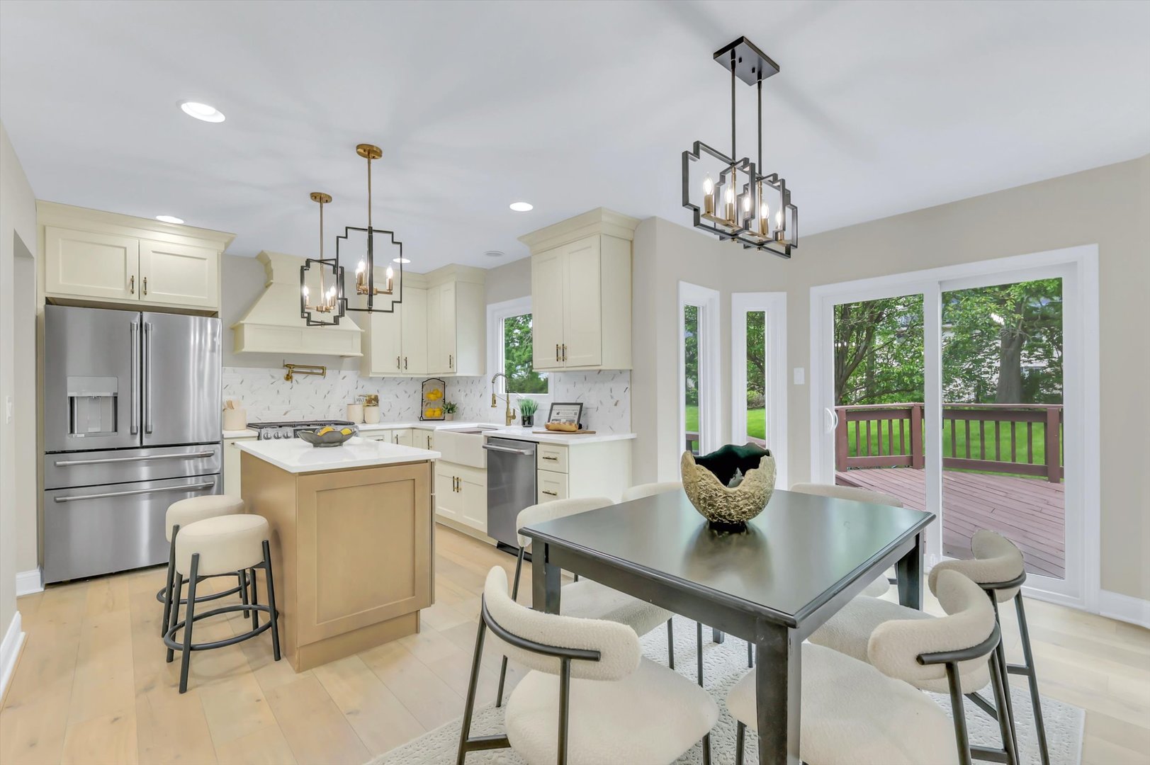 967 West Bauer Road Naperville, IL 60563 - Photo 13 of 37 a kitchen with stainless steel appliances a dining table chairs and chandelier