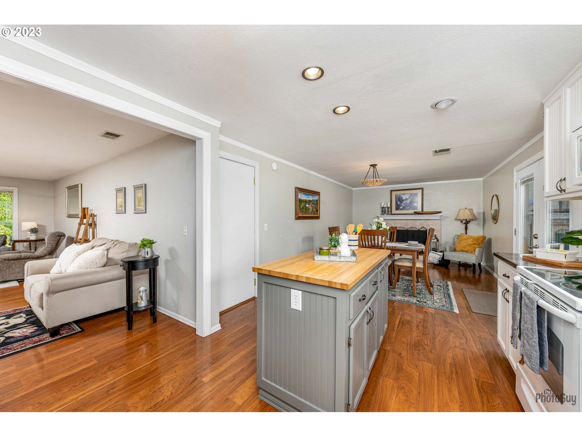 5621 C Street Springfield, OR 97478 - Photo 12 of 29 a living room with furniture and a wooden floor